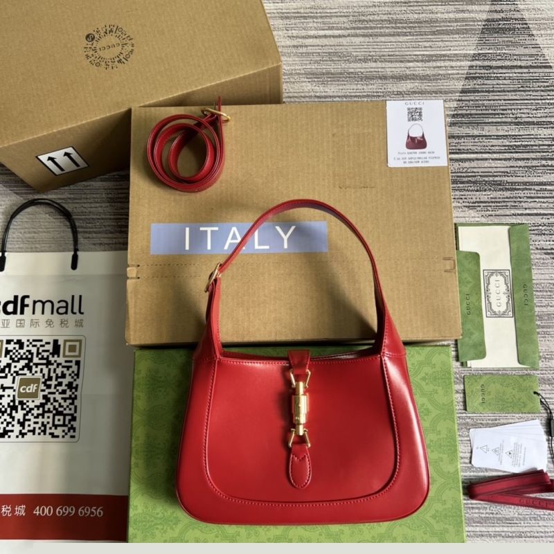 G*u*i top handle bags